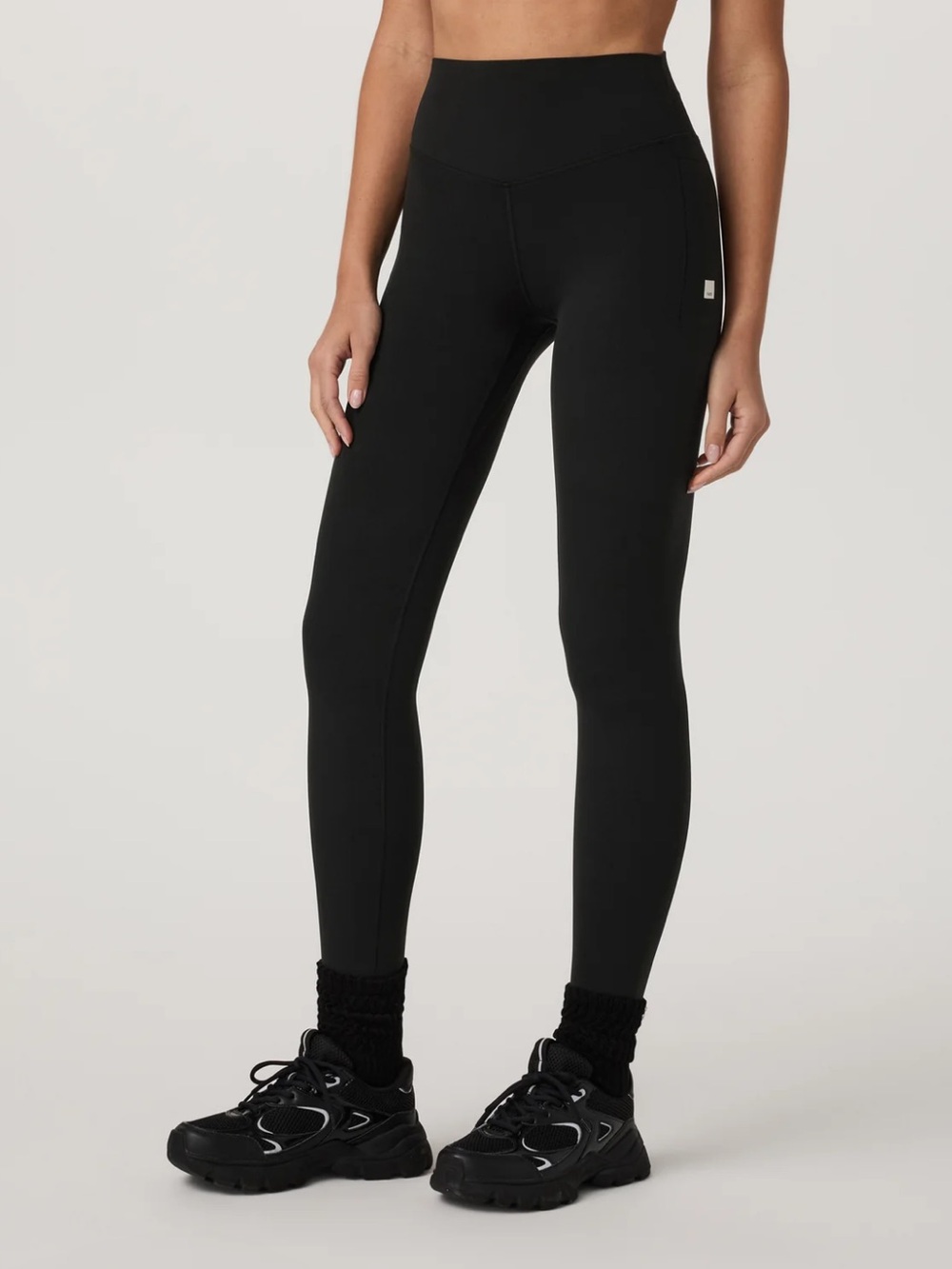 VUORI AllTheForm Pocket Leggings with Embroidered Raiders Emblem. Size Small.